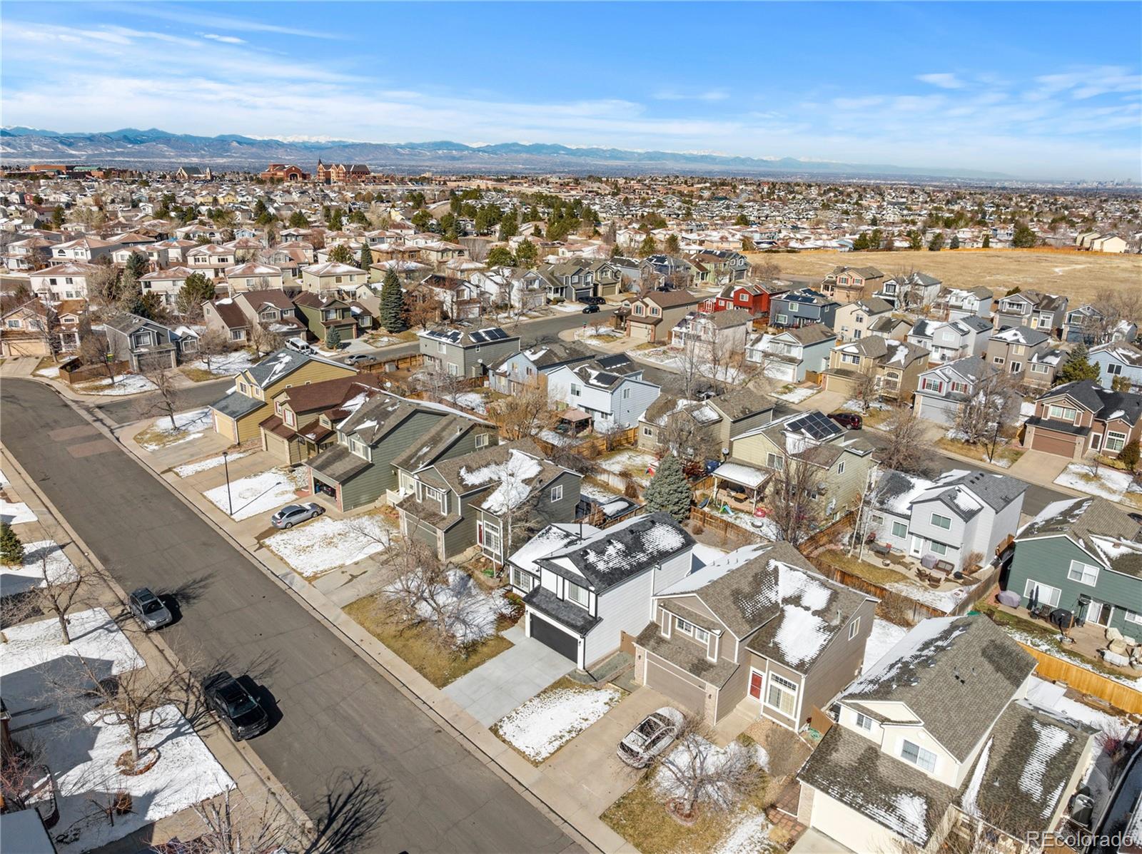 4865 Apollo Bay Drive Highlands Ranch, CO 80130 - Photo 36 of 38 an aerial view of a city