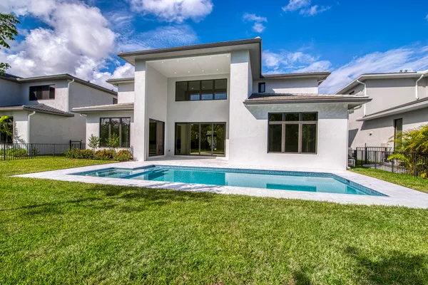 a view of a house with a swimming pool