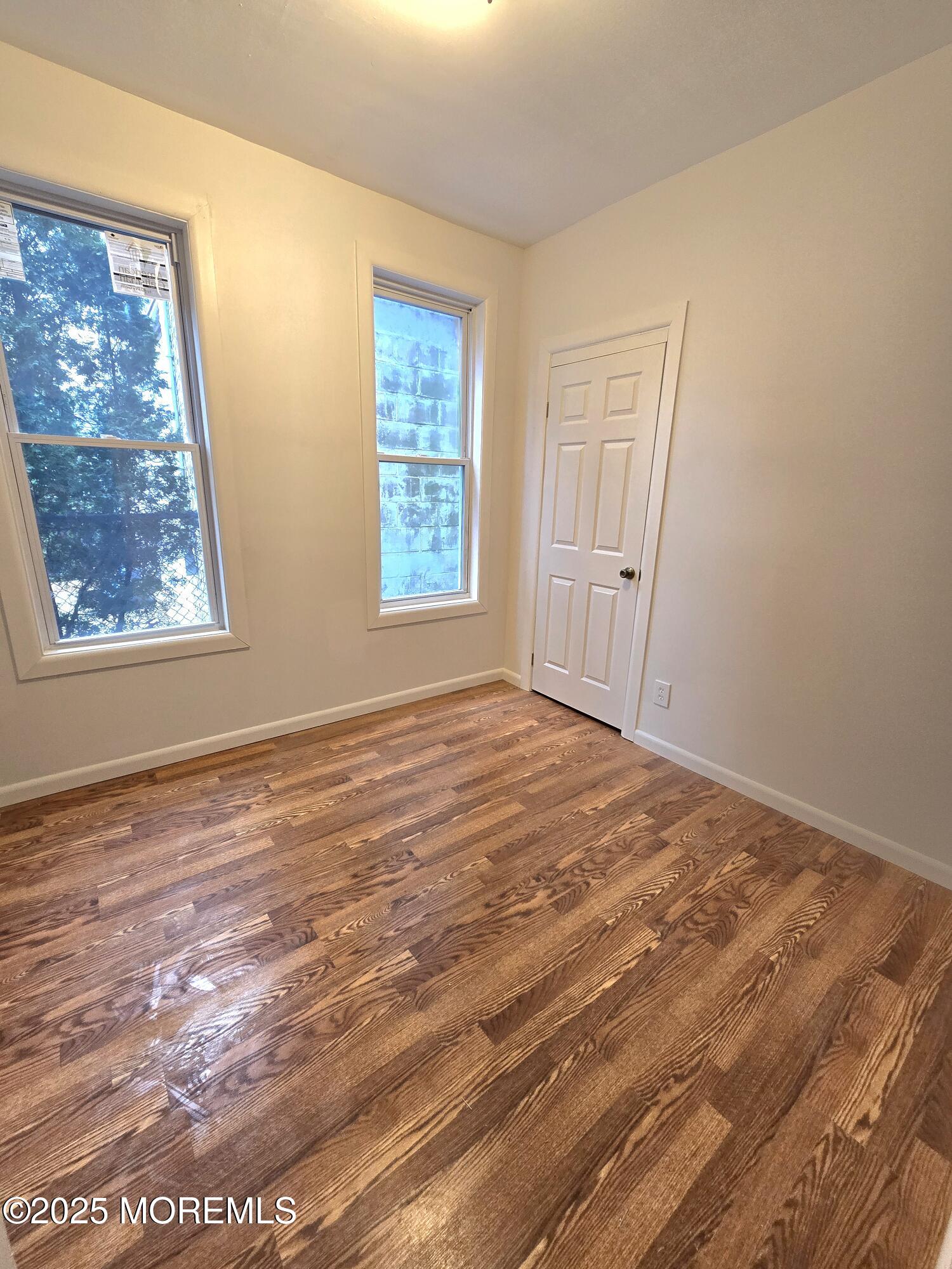 1010 Sewall Avenue, Unit 1 Asbury Park, NJ 07712 - Photo 3 of 6 a view of a room with window