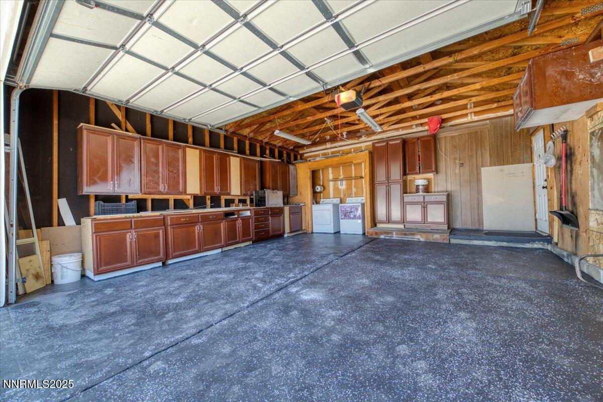 1340 Rayburn Drive Reno, NV 89503 - Photo 39 of 42 a view of an empty room with wooden walls