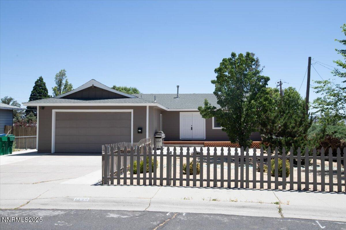 1340 Rayburn Drive Reno, NV 89503 - Photo 40 of 42 a front view of a house with a fence