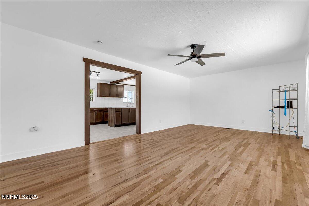 1340 Rayburn Drive Reno, NV 89503 - Photo 4 of 42 wooden floor in an empty room with a window