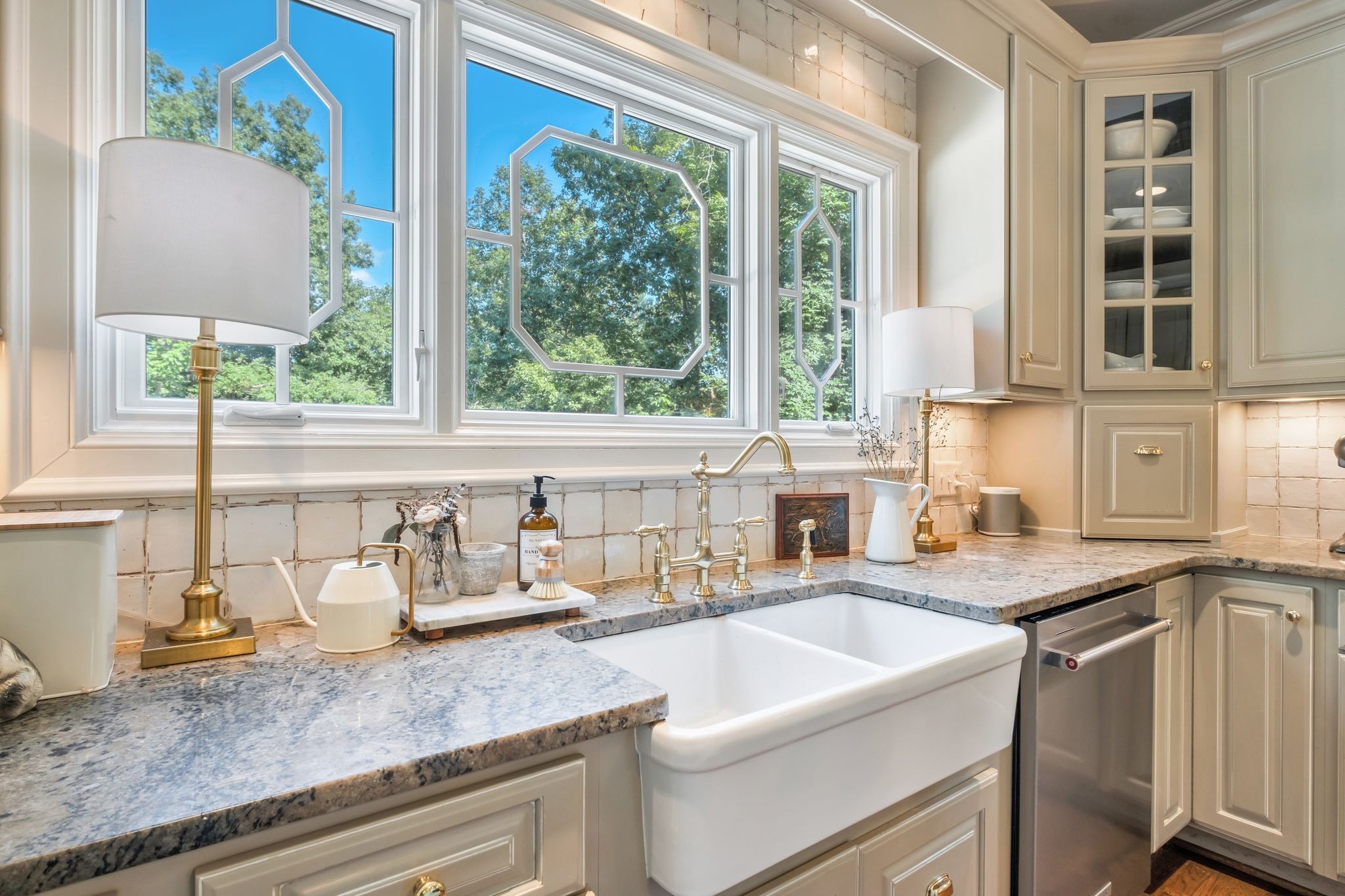 5468 Parker Branch Road Franklin, TN 37064 - Photo 22 of 99 a kitchen with granite countertop a sink and a window