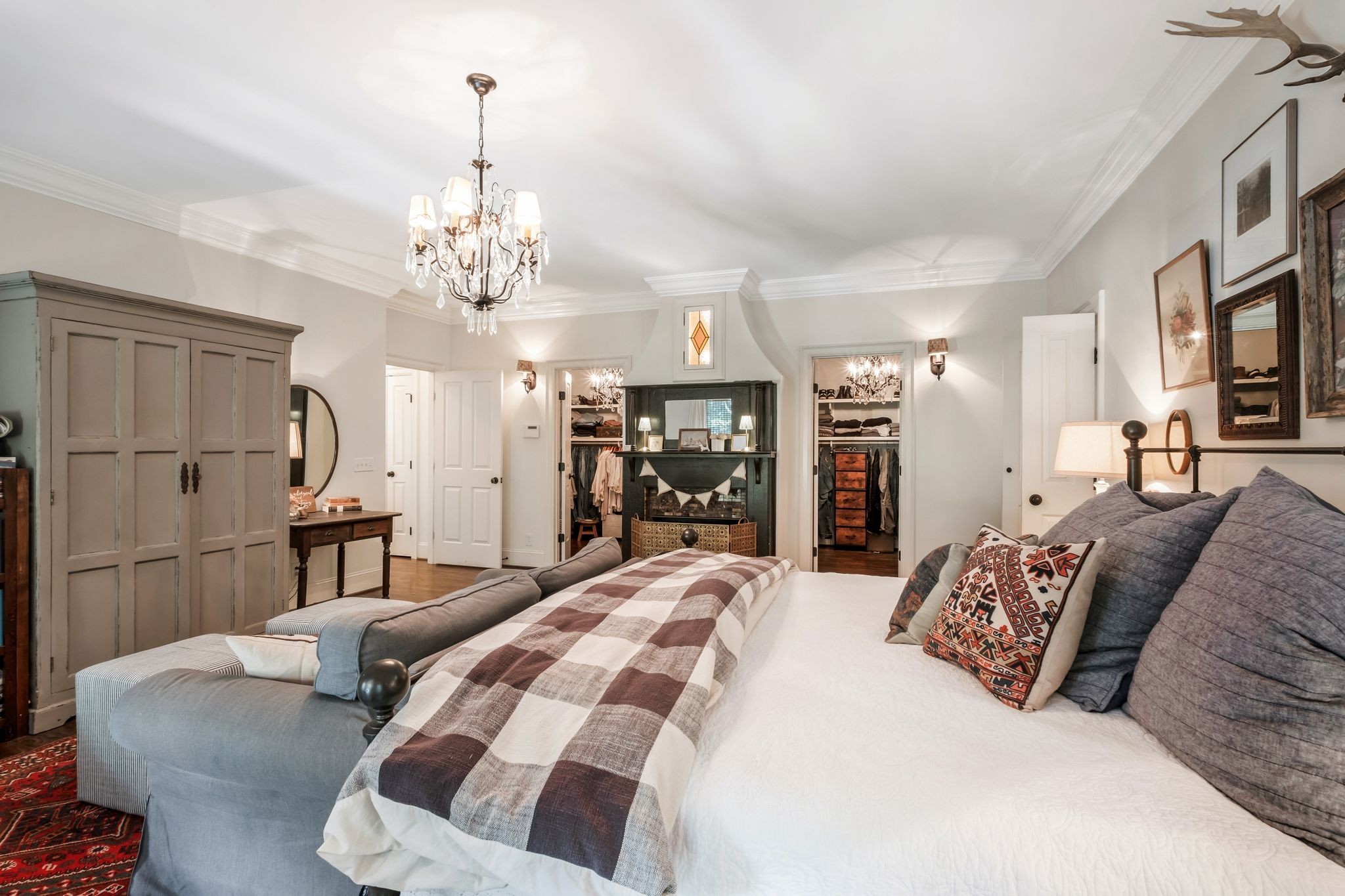 5468 Parker Branch Road Franklin, TN 37064 - Photo 37 of 99 a bedroom with a bed and a chandelier