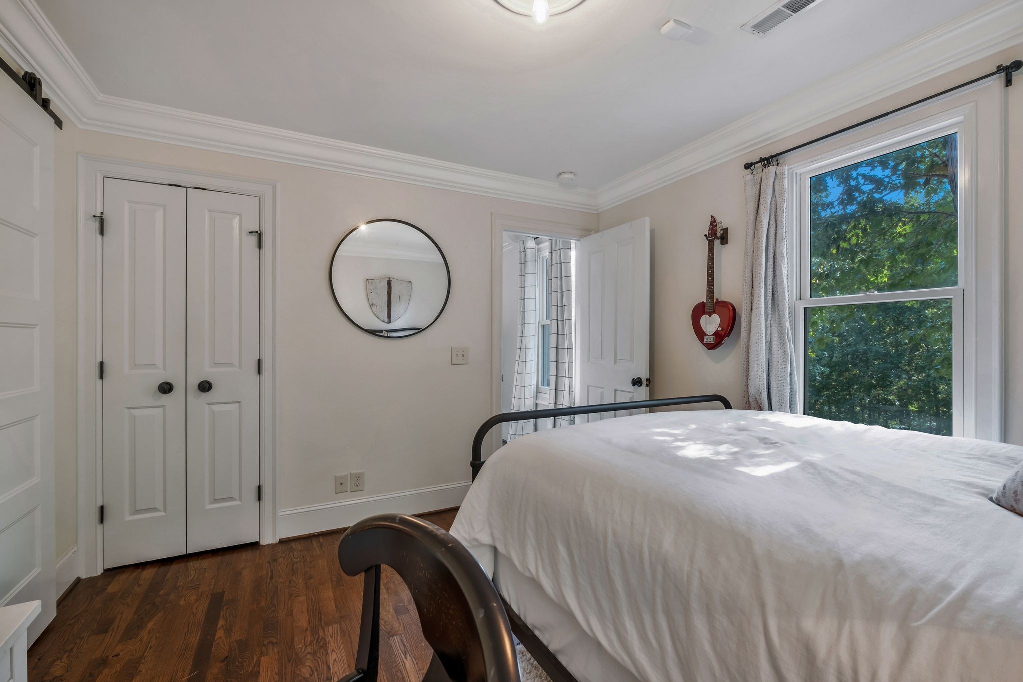 5468 Parker Branch Road Franklin, TN 37064 - Photo 57 of 99 a bed sitting in a spacious bedroom next to a window