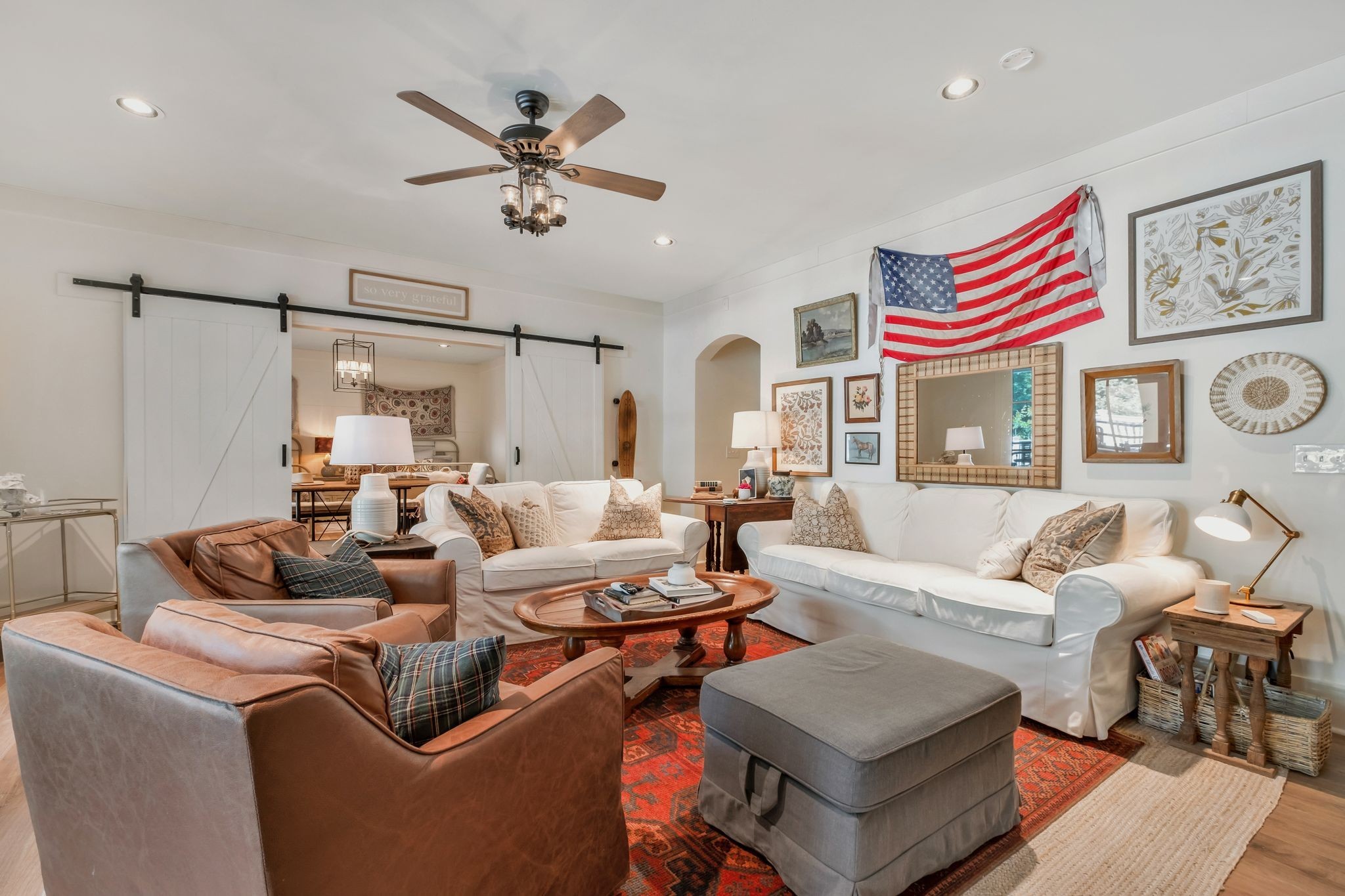 5468 Parker Branch Road Franklin, TN 37064 - Photo 60 of 99 a living room with furniture and a chandelier