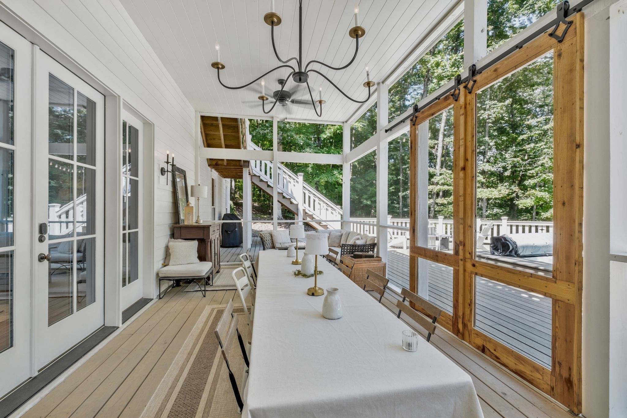 5468 Parker Branch Road Franklin, TN 37064 - Photo 85 of 99 a view of living room with furniture large windows and wooden floor