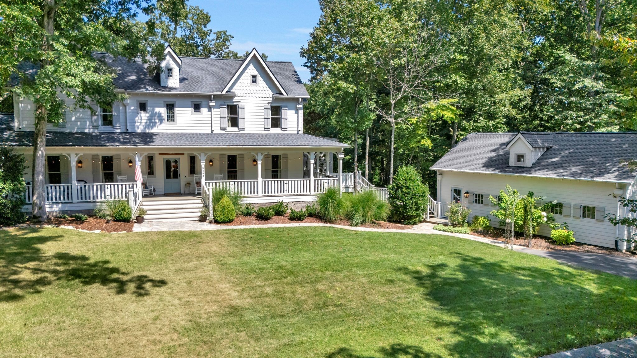 5468 Parker Branch Road Franklin, TN 37064 - Photo 98 of 99 a view of a house with a yard and plants
