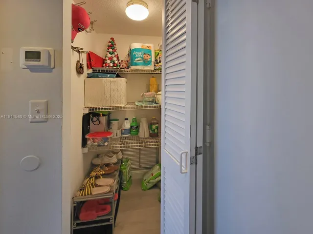 a view of storage and utility room