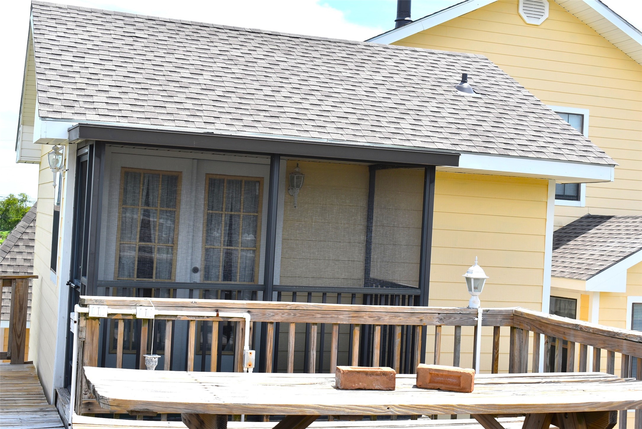 1657 County Road Sargent, TX 77414 - Photo 20 of 46 a view of a wooden chair and a window