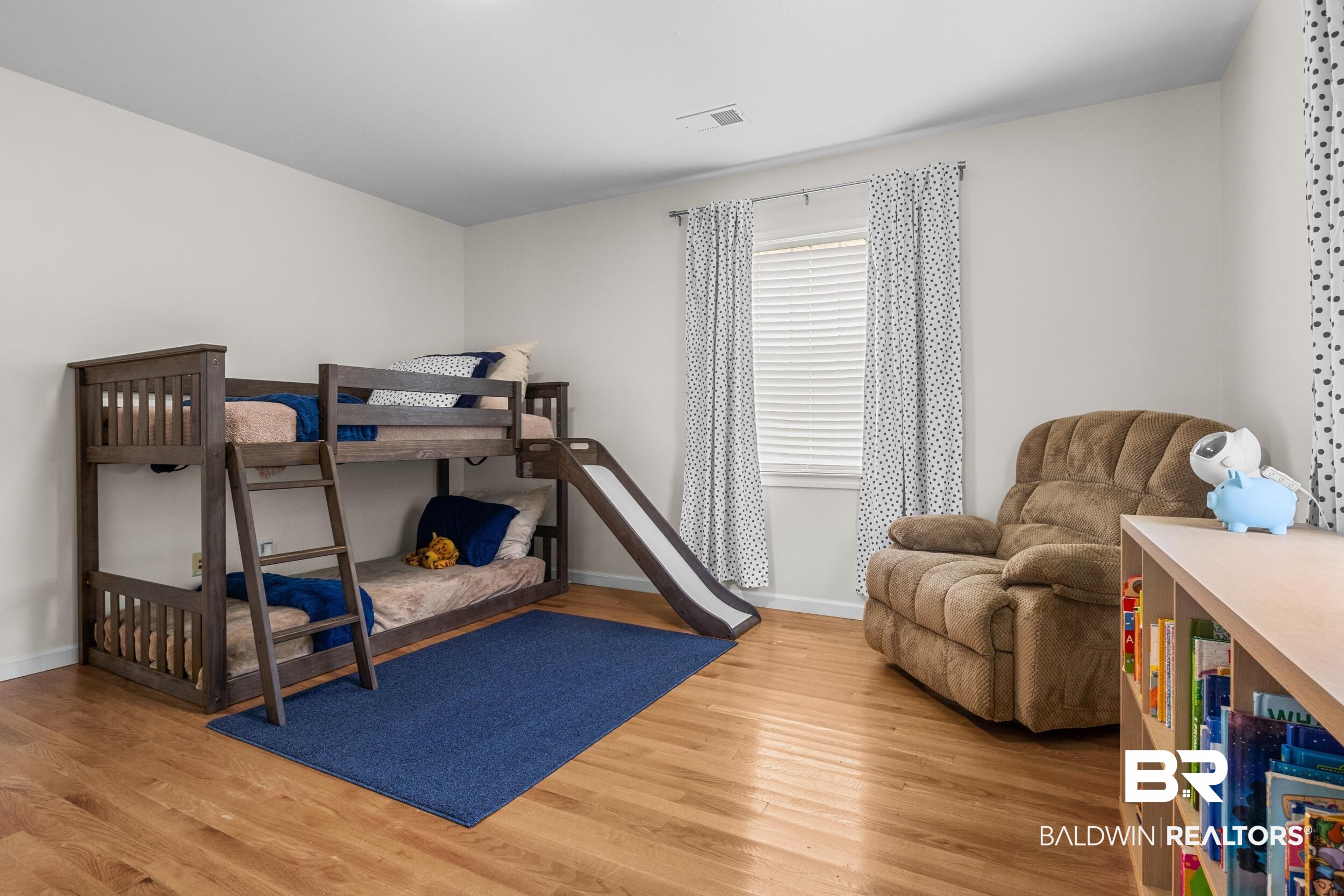 17689 Brewer Road Foley, AL 36535 - Photo 26 of 54 Bedroom featuring hardwood / wood-style flooring
