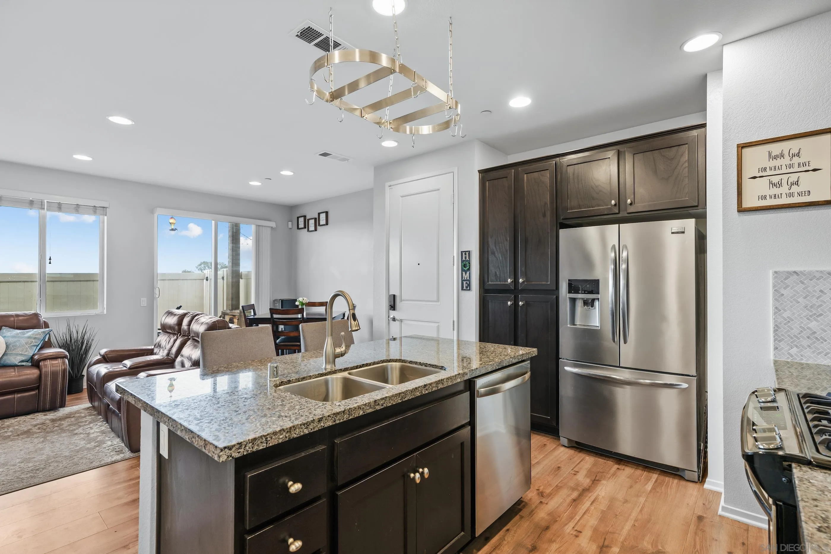 5481 San Roberto San Diego, CA 92154 - Photo 1 of 32 a kitchen with stainless steel appliances granite countertop a sink a refrigerator and a refrigerator