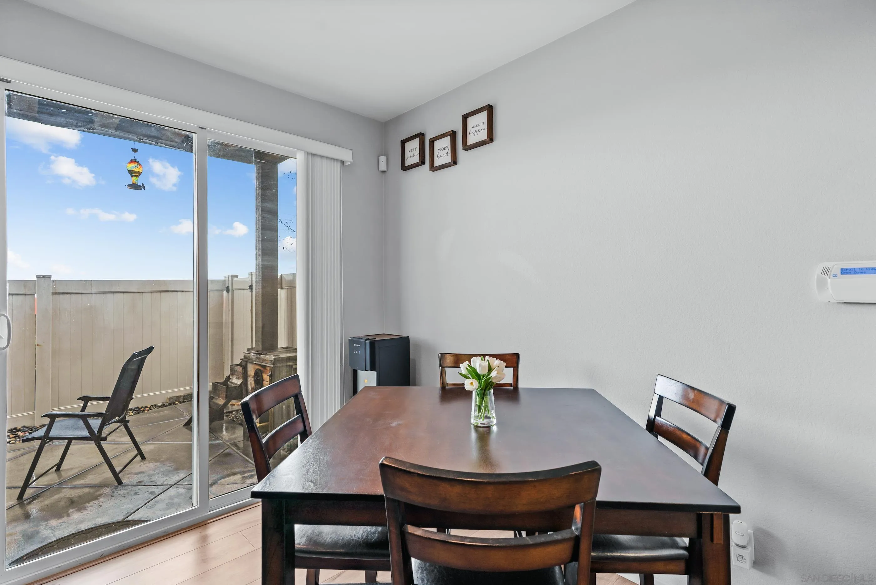 5481 San Roberto San Diego, CA 92154 - Photo 13 of 32 a view of a dining room with furniture