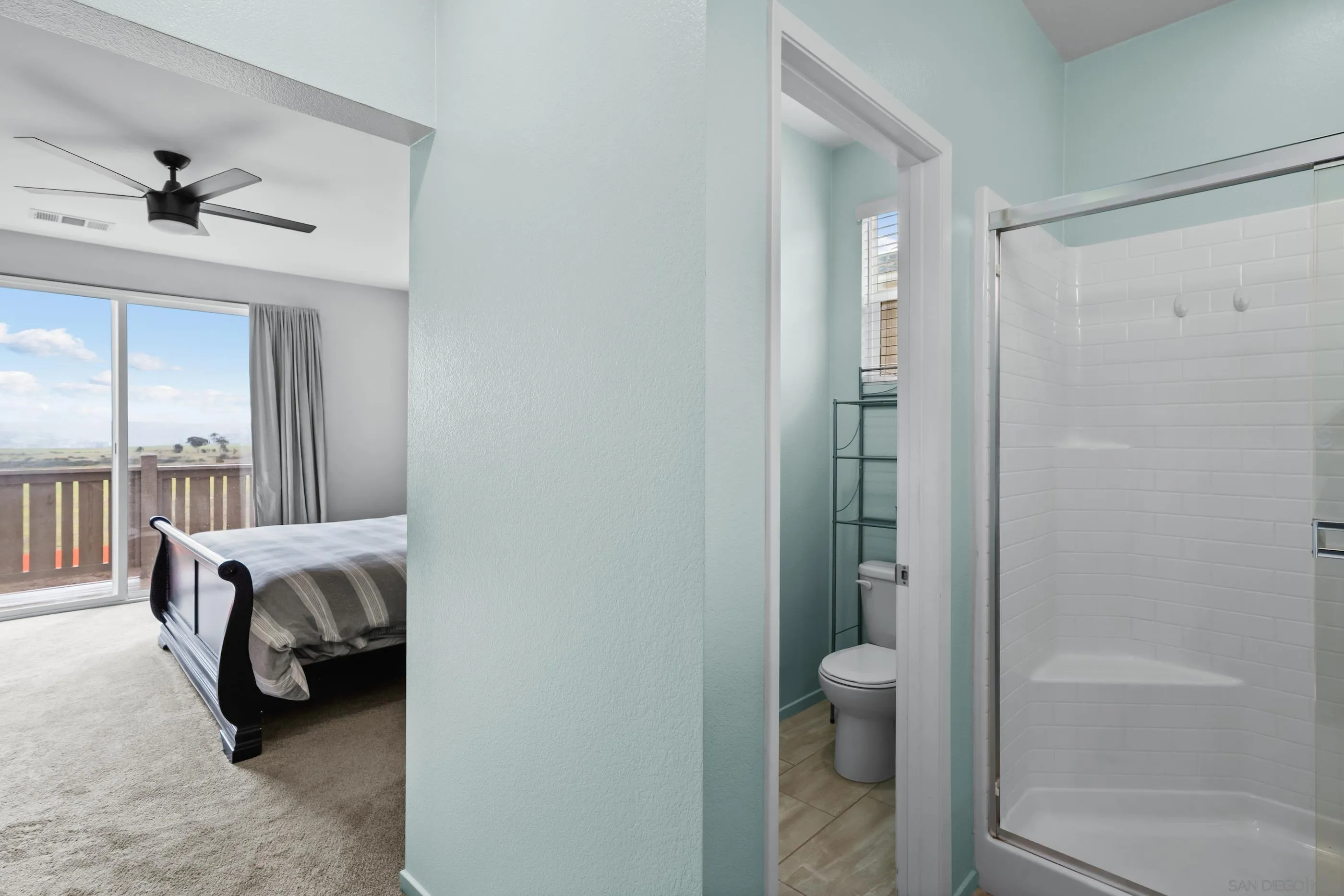 5481 San Roberto San Diego, CA 92154 - Photo 19 of 32 a bedroom with a bed and a window