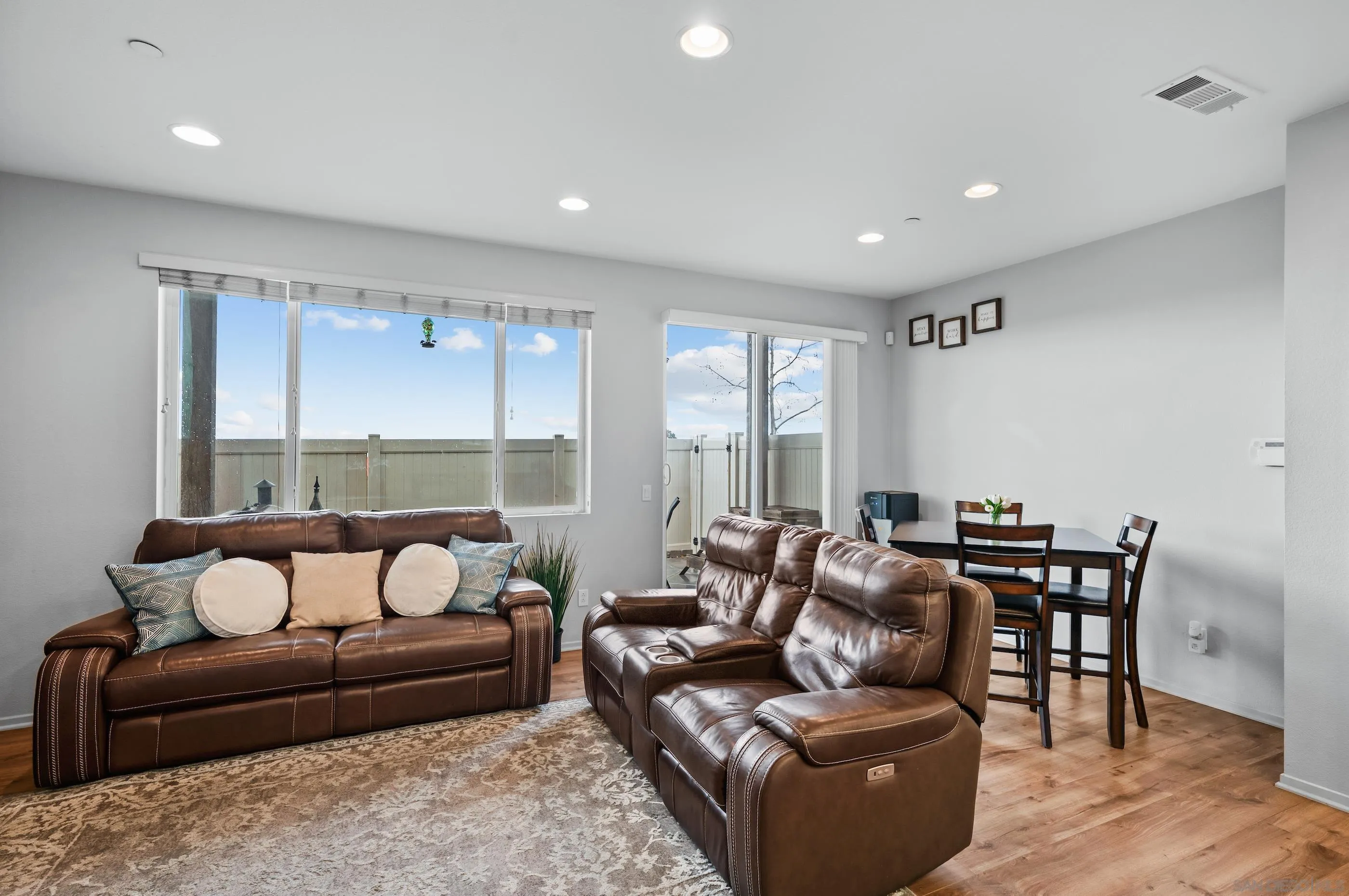 5481 San Roberto San Diego, CA 92154 - Photo 2 of 32 a living room with furniture and a large window