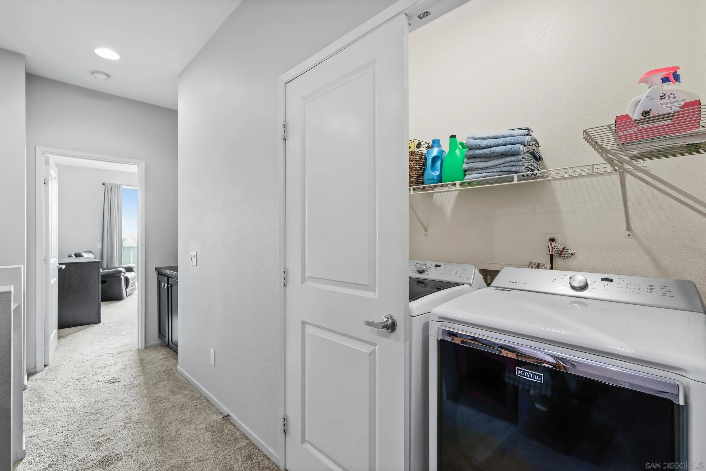 5481 San Roberto San Diego, CA 92154 - Photo 26 of 32 a utility room with a sink dryer and washer