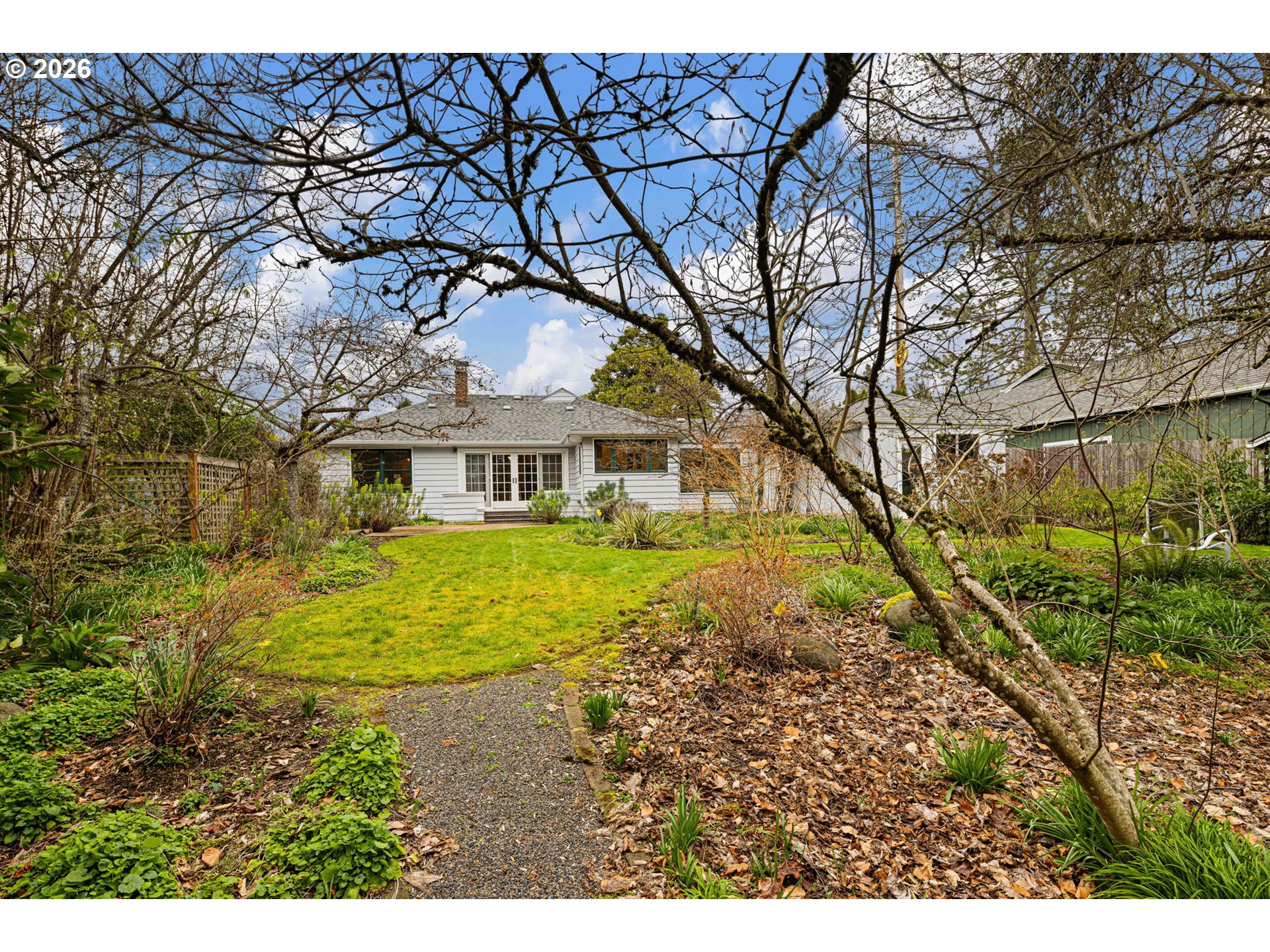 940 East 23rd Avenue Eugene, OR 97405 - Photo 12 of 48 a front view of a house with a yard