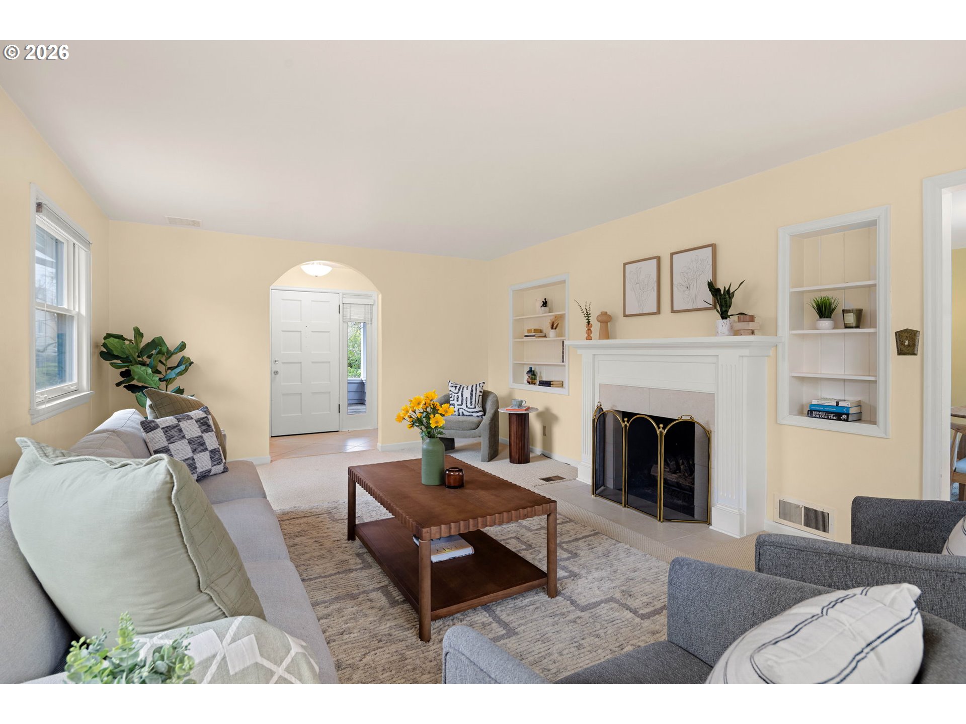 940 East 23rd Avenue Eugene, OR 97405 - Photo 17 of 48 a living room with furniture a fireplace and a potted plant
