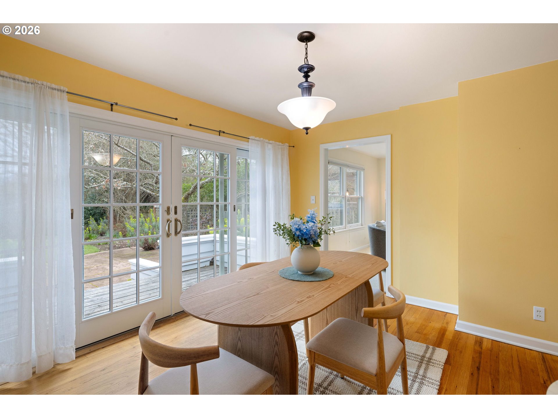 940 East 23rd Avenue Eugene, OR 97405 - Photo 21 of 48 a view of a dining room with furniture and wooden floor