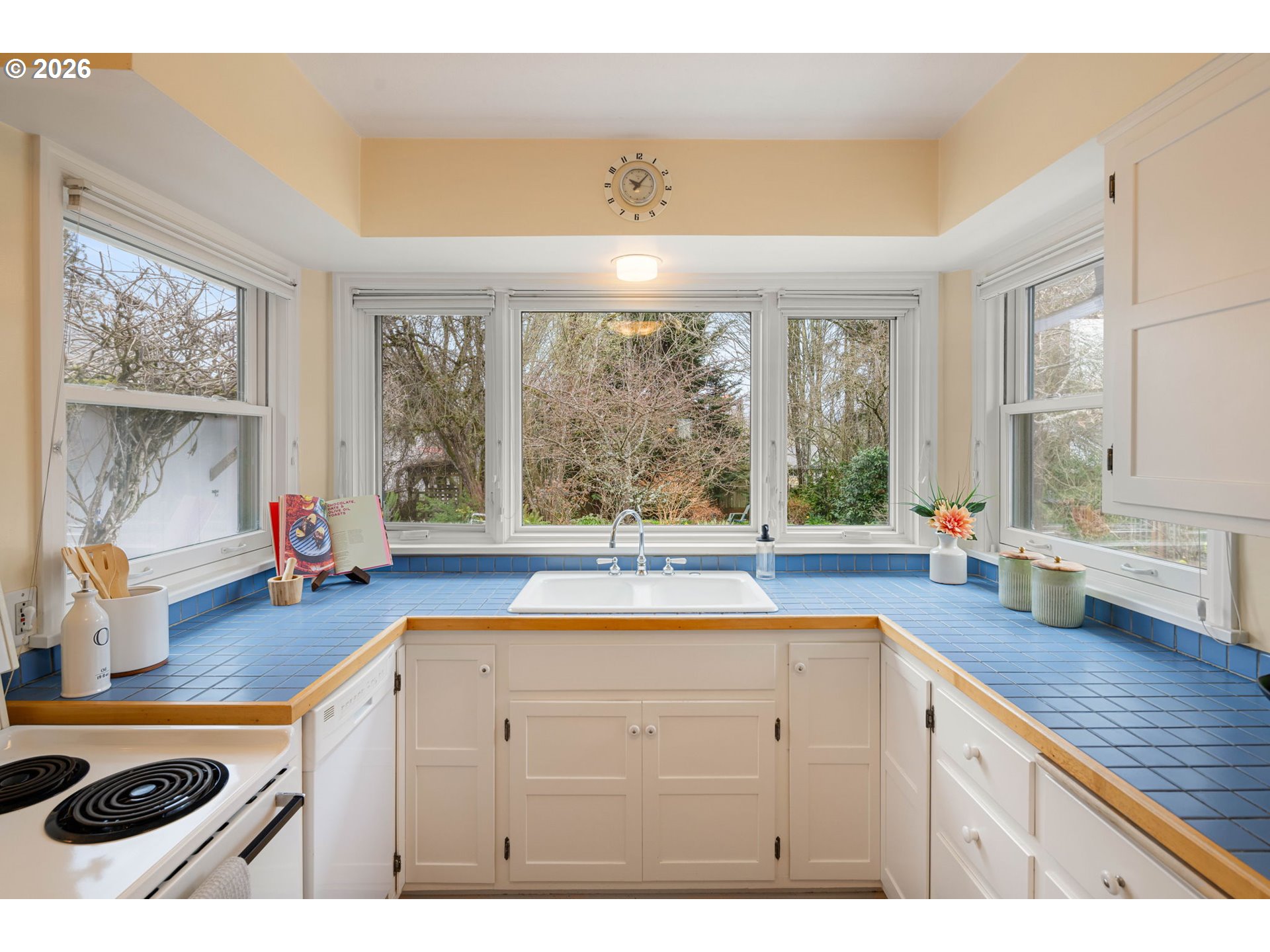 940 East 23rd Avenue Eugene, OR 97405 - Photo 26 of 48 a kitchen with a sink and large windows
