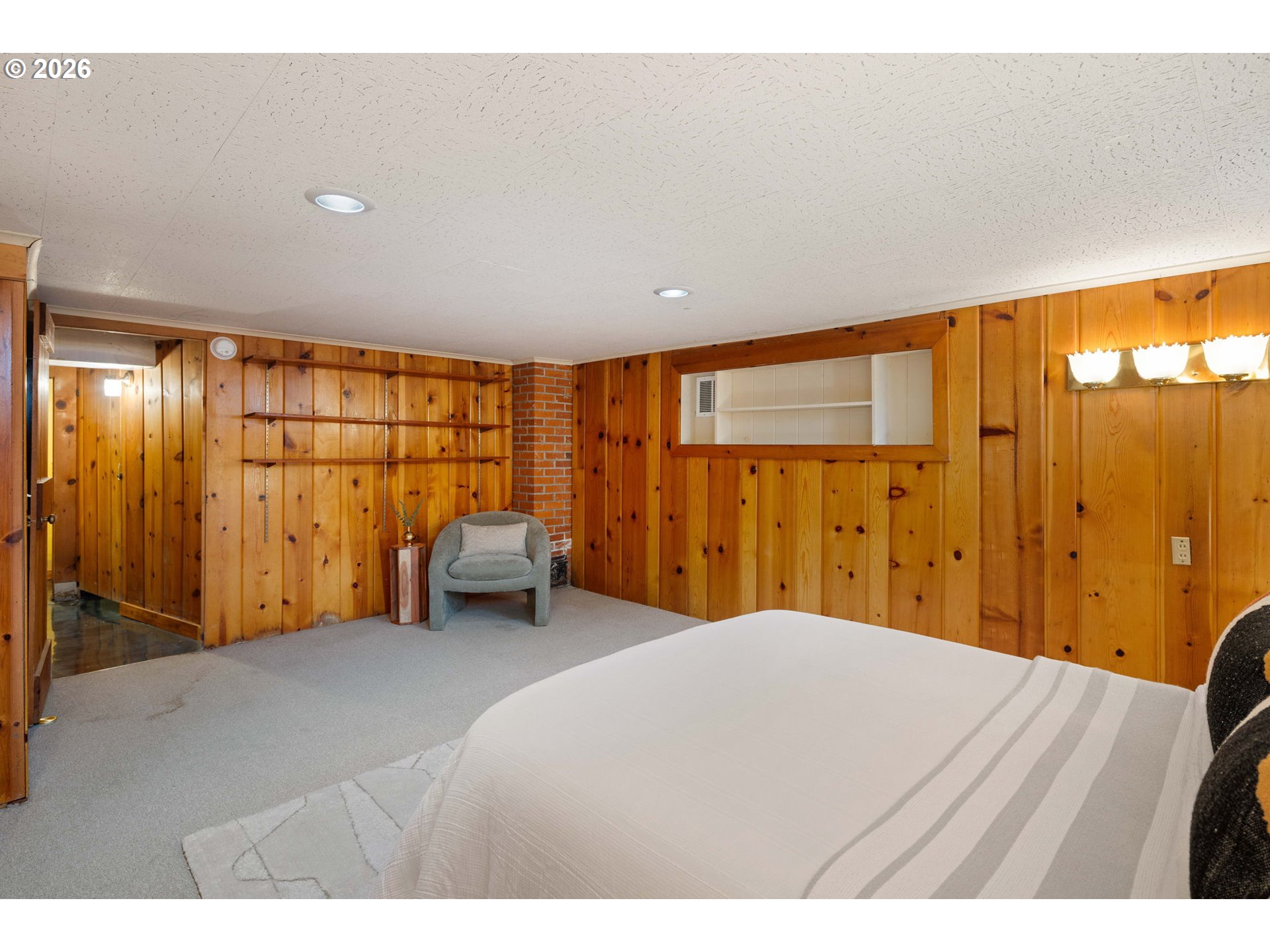 940 East 23rd Avenue Eugene, OR 97405 - Photo 39 of 48 a bedroom with a bed and wooden floor