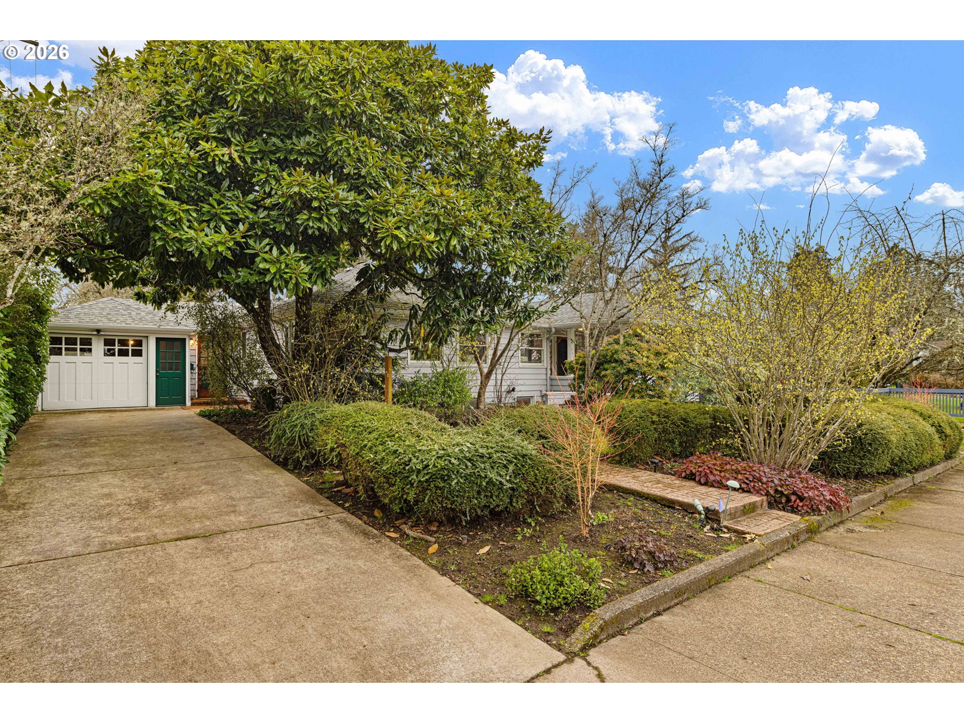 940 East 23rd Avenue Eugene, OR 97405 - Photo 42 of 48 a view of a house with a yard
