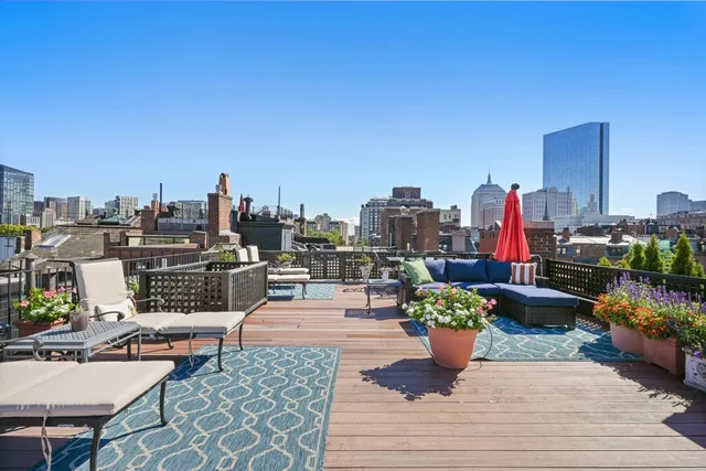 a view of a terrace with seating space