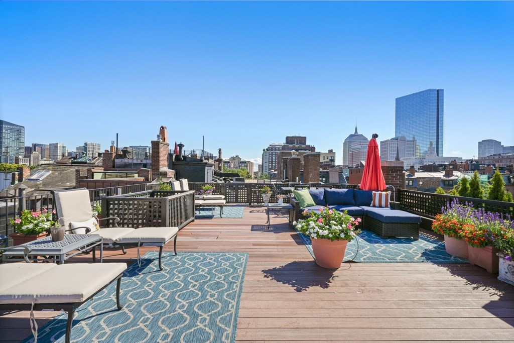 95 Beacon Street, Unit PH Boston, MA 02108 - Photo 8 of 14 a view of a terrace with seating space