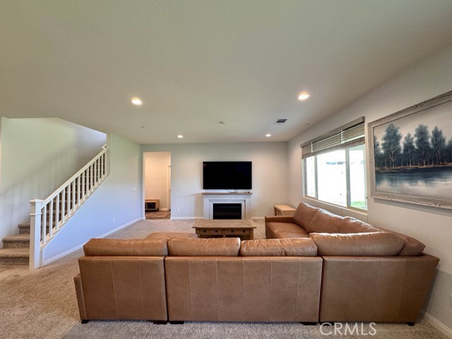 34110 Big Sur Drive Murrieta, CA 92563 - Photo 23 of 58 a living room with furniture and a flat screen tv