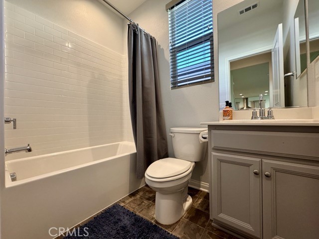 34110 Big Sur Drive Murrieta, CA 92563 - Photo 28 of 58 a bathroom with a sink toilet and shower
