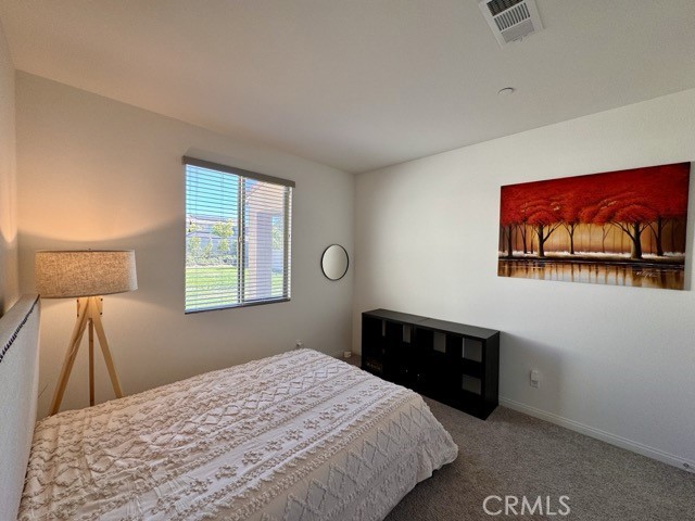 34110 Big Sur Drive Murrieta, CA 92563 - Photo 30 of 58 a bedroom with a bed and a window