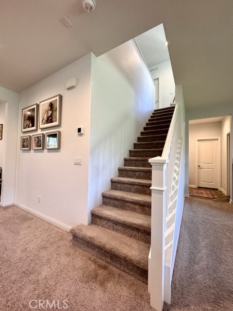 34110 Big Sur Drive Murrieta, CA 92563 - Photo 32 of 58 a view of a hallway with staircase