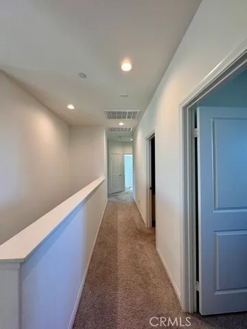 a workspace with furniture and a window