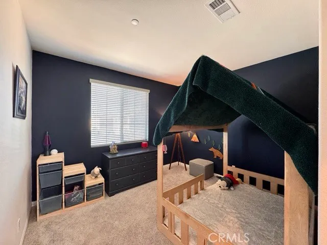 a workspace with furniture and a window