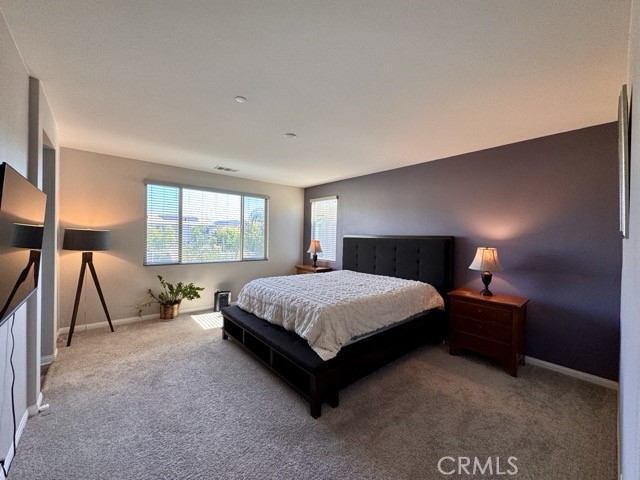 34110 Big Sur Drive Murrieta, CA 92563 - Photo 47 of 58 a bedroom with a bed and a window
