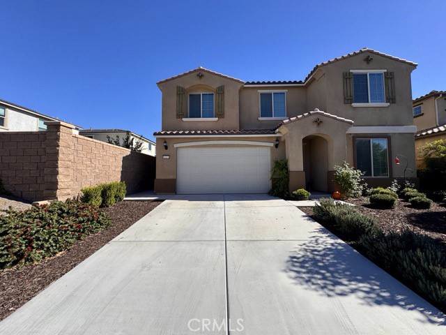 34110 Big Sur Drive Murrieta, CA 92563 - Photo 5 of 58 a front view of a house with yard