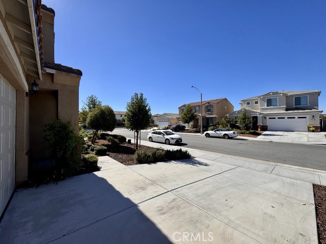 34110 Big Sur Drive Murrieta, CA 92563 - Photo 6 of 58 a view of street with parked cars
