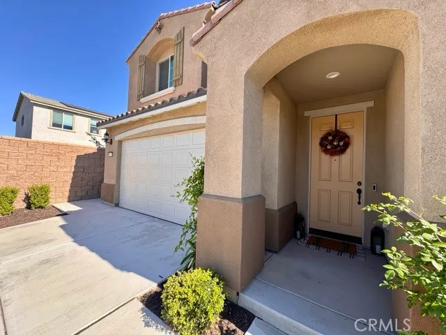 a living room with furniture gym equipment and a rug