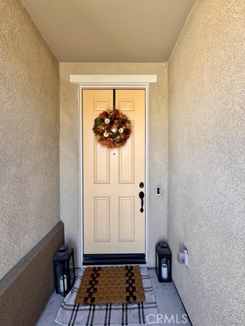 34110 Big Sur Drive Murrieta, CA 92563 - Photo 8 of 58 a view of room with a door and a window