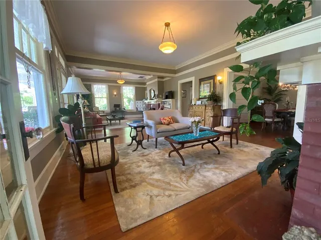 a kitchen with a checkered floor and a refrigerator