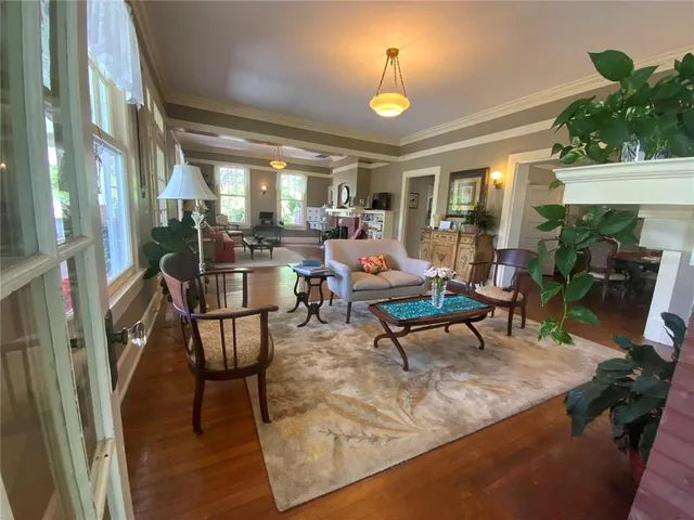 a front view of house with yard and trees