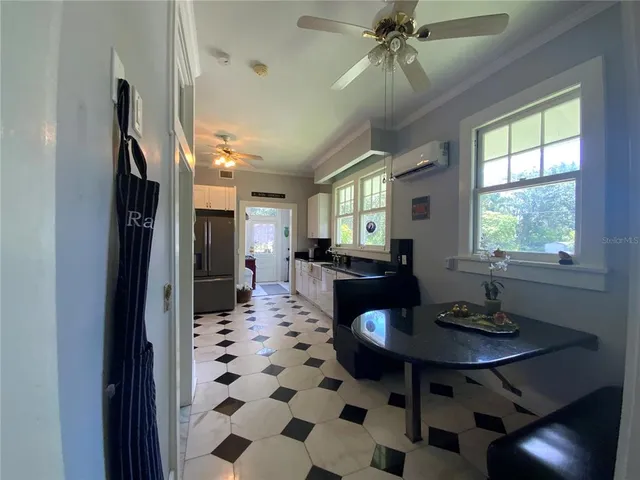 a view of a garden with a building in the background