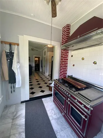 a view of a house with swimming pool and a yard