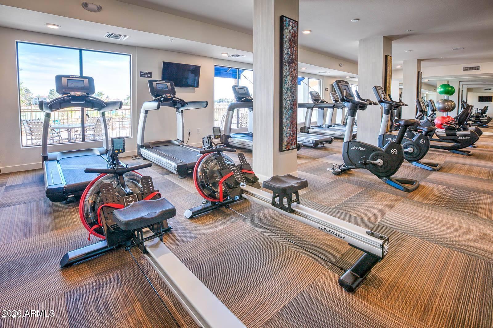 2511 West Queen Creek Road, Unit 260 Chandler, AZ 85248 - Photo 16 of 24 a view of a room with gym equipment