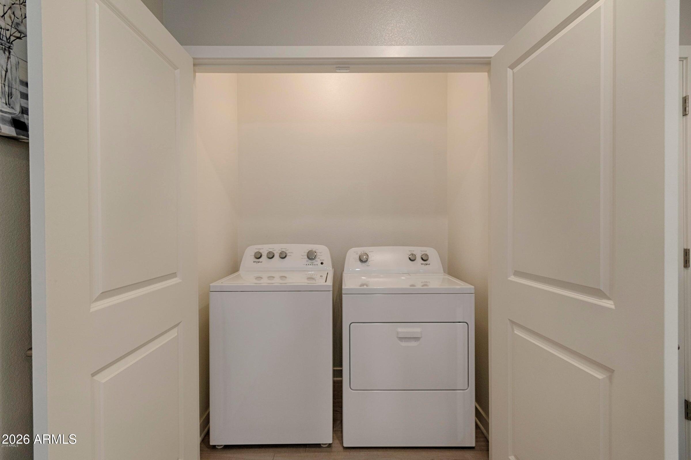 2511 West Queen Creek Road, Unit 260 Chandler, AZ 85248 - Photo 17 of 24 a utility room with dryer and washer