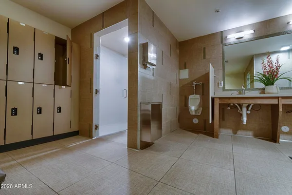 a view of swimming pool with outdoor seating and city view