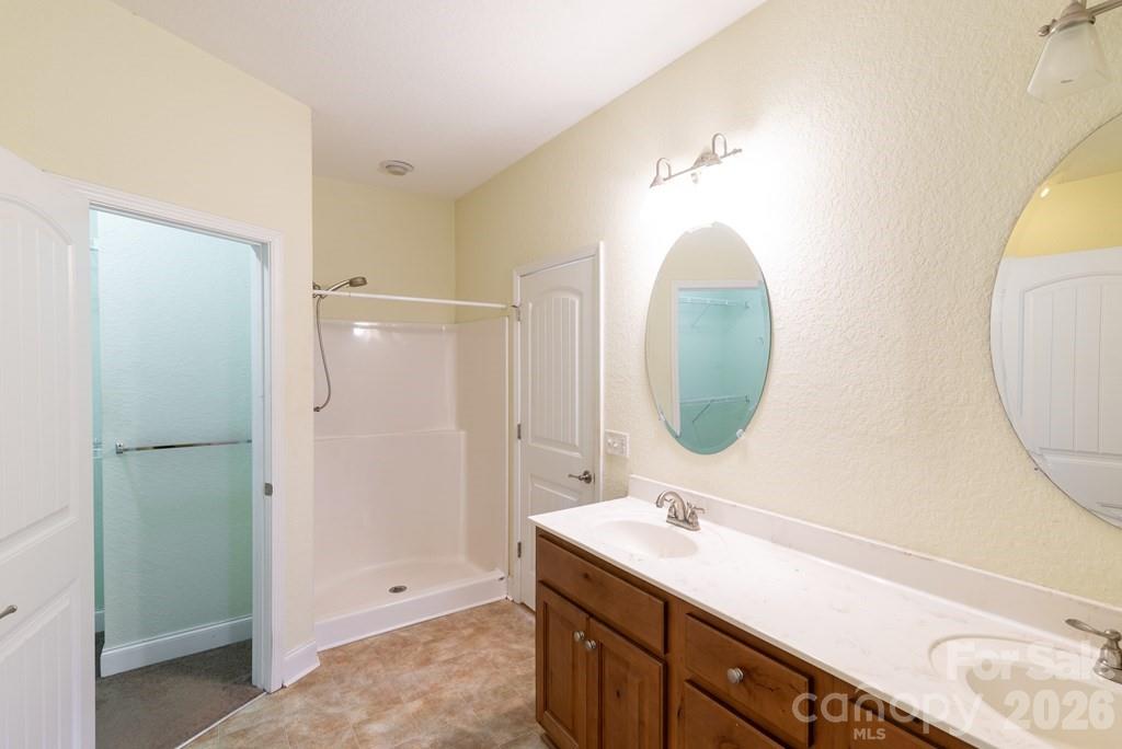 12 Chigger Ridge Road Sylva, NC 28779 - Photo 14 of 28 a bathroom with a sink and a mirror