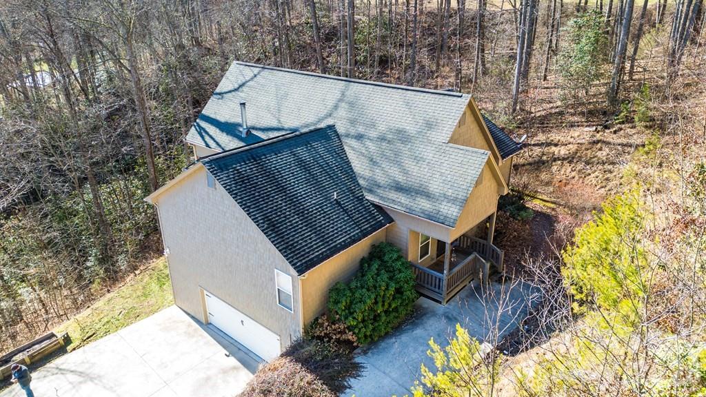 12 Chigger Ridge Road Sylva, NC 28779 - Photo 5 of 28 a view of a house with a dry back yard