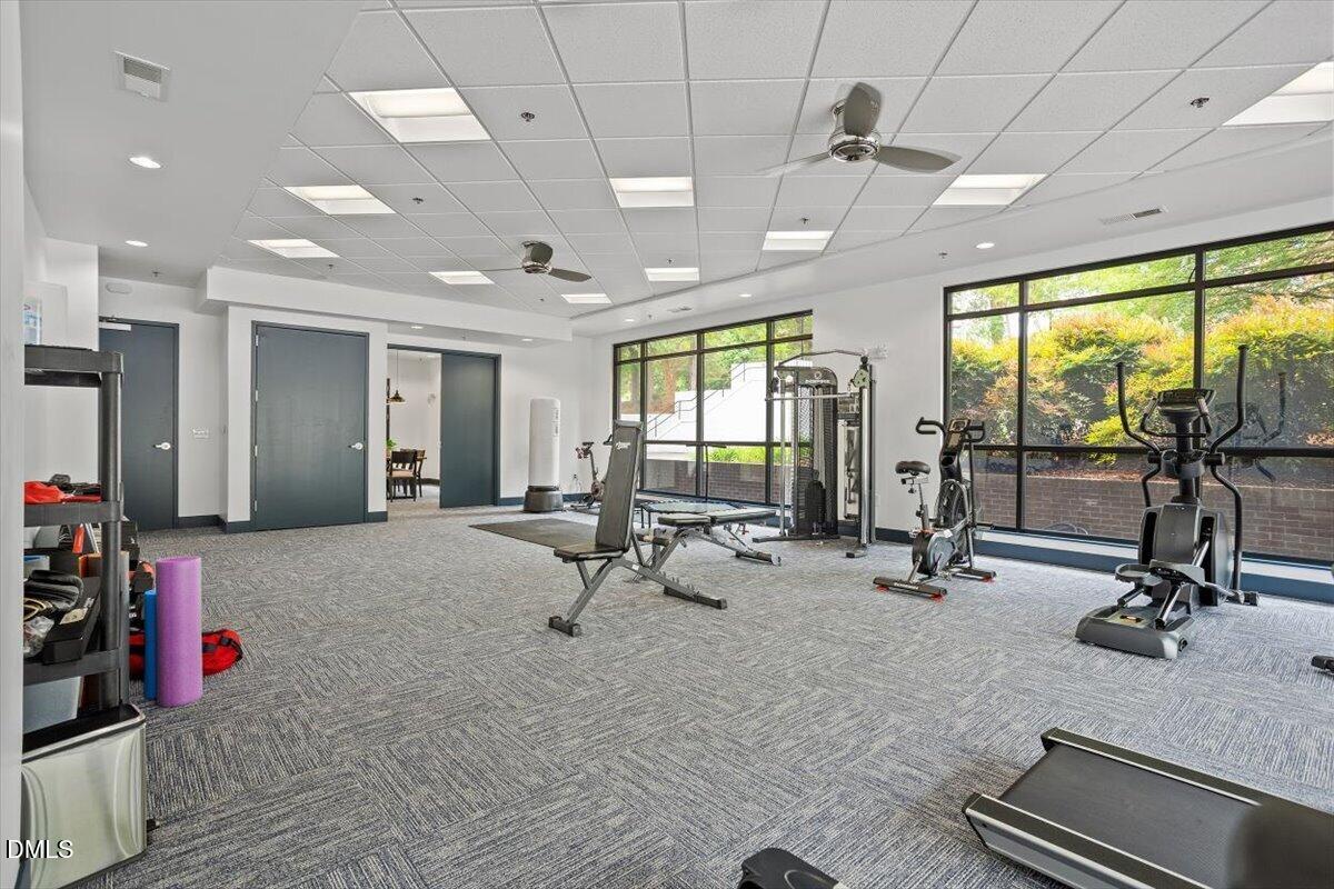 1300 St Marys Street, Unit 207 Raleigh, NC 27605 - Photo 31 of 31 a view of a room with gym equipment