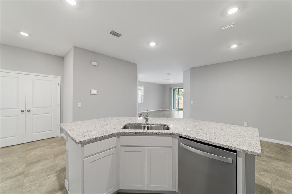 5339 Northwest 46th Ln Road Ocala, FL 34482 - Photo 22 of 79 a kitchen with a sink and cabinets